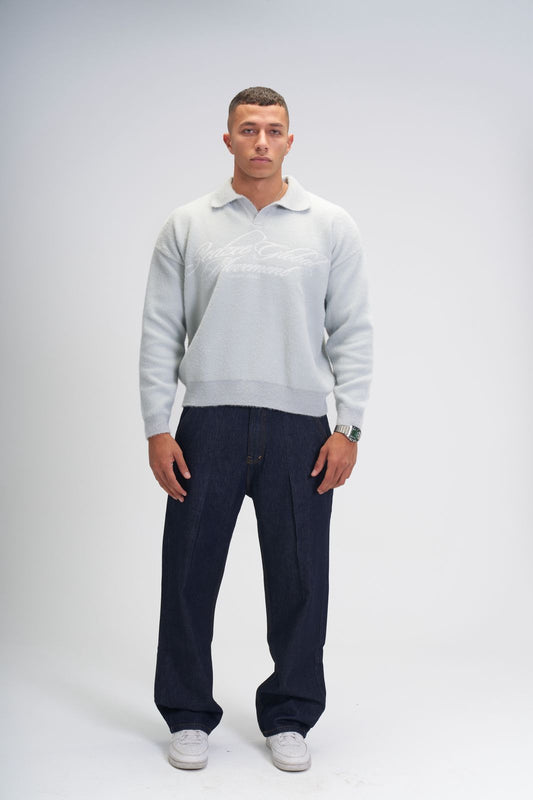 Global movement knit polo