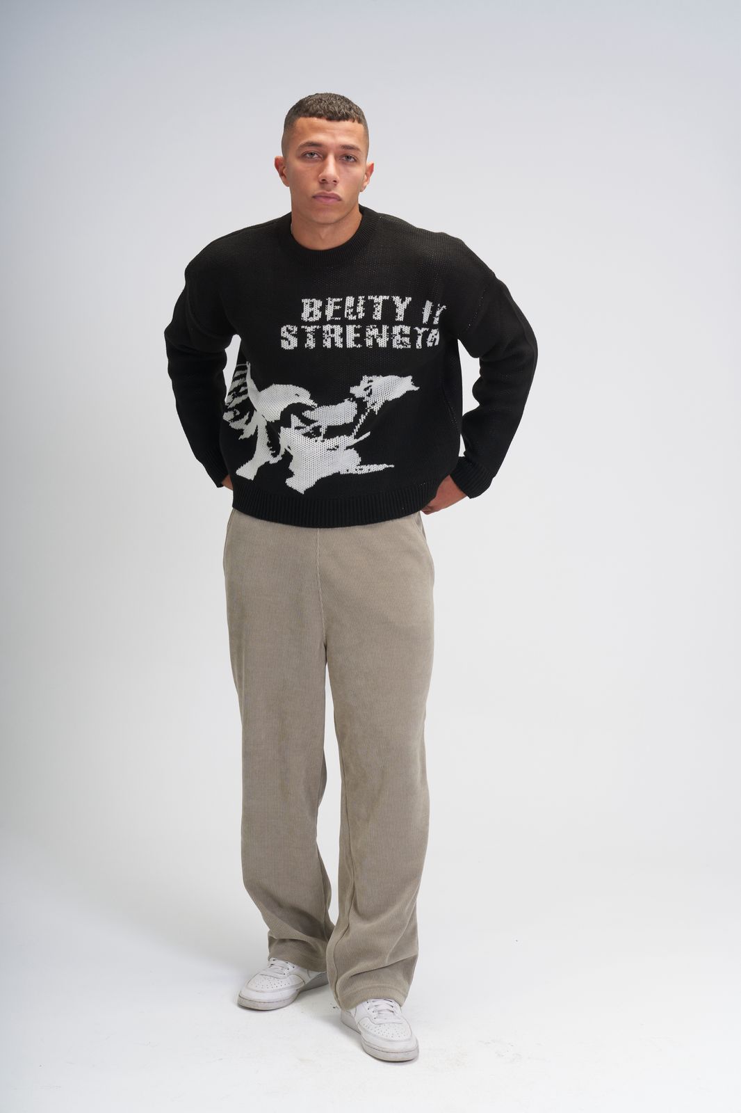 Beuty in Strength knit crewneck