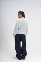 Global movement knit polo
