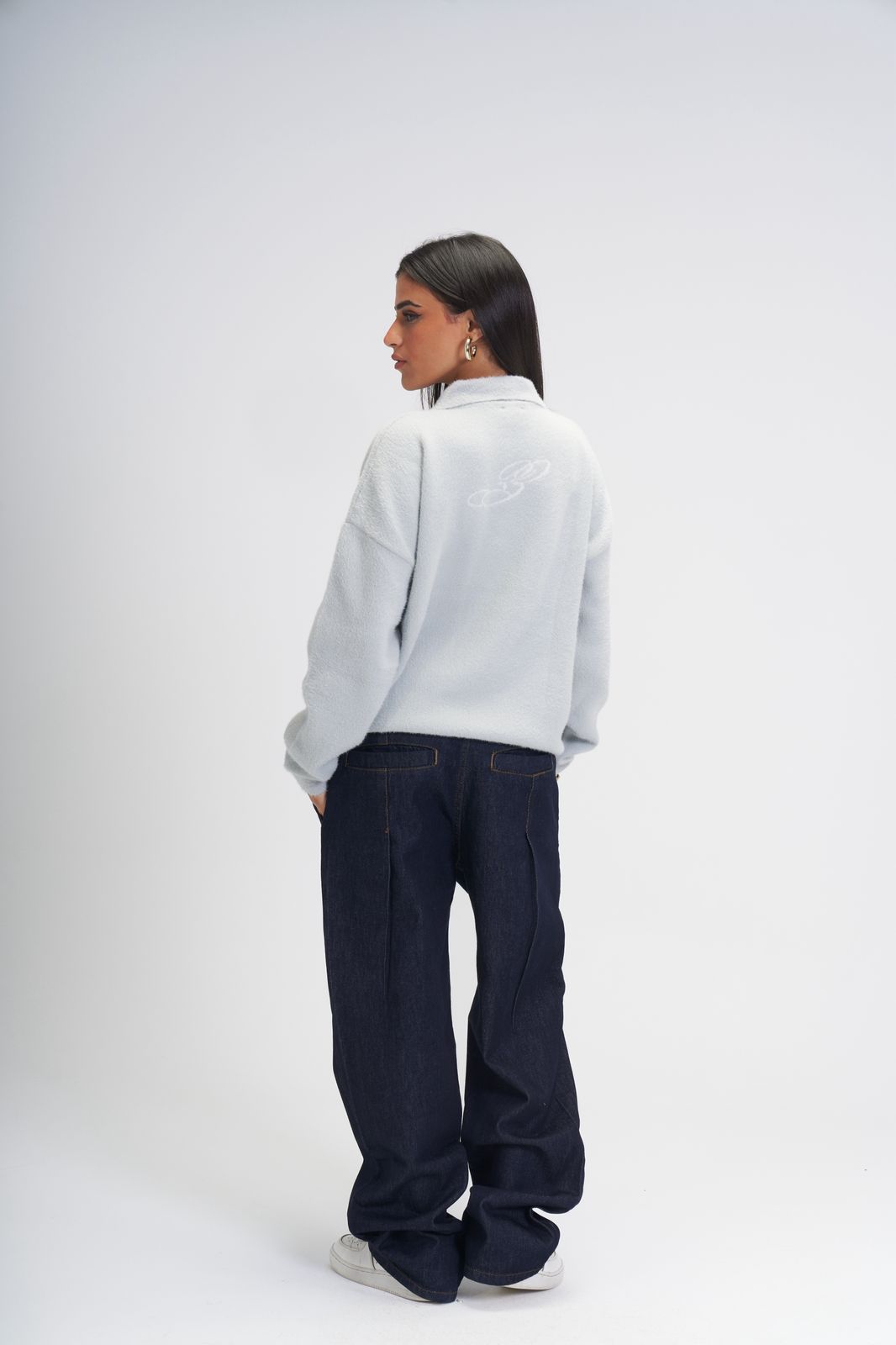 Global movement knit polo