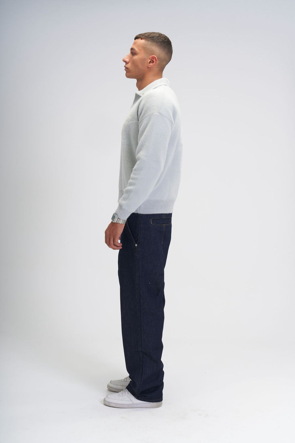 Global movement knit polo