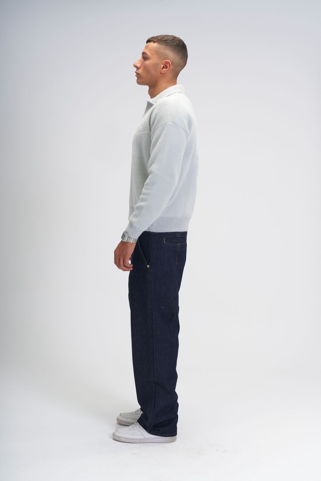 Global movement knit polo