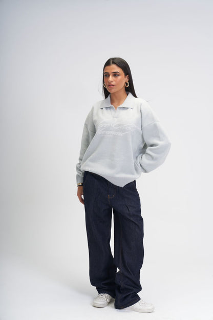 Global movement knit polo